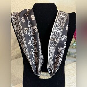 Ladies 41 x 5 fleur-de-lis neck or‎ purse scarf. Brownish Black with White/Gray